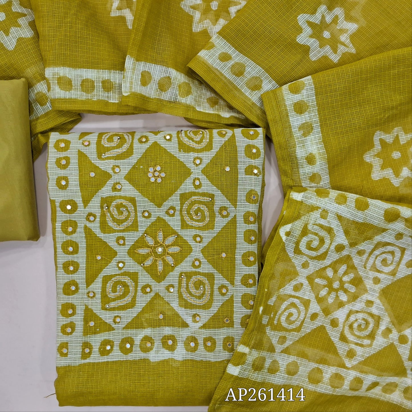 Mehandhi green pure kota unstitched salwar material,wax batik yoke with thread and faux mirror,wax batik printed allover,(thin, lining needed)matching silky fabric provided for both bottom and lining, batik design on kota silk cotton dupatta. AP261414