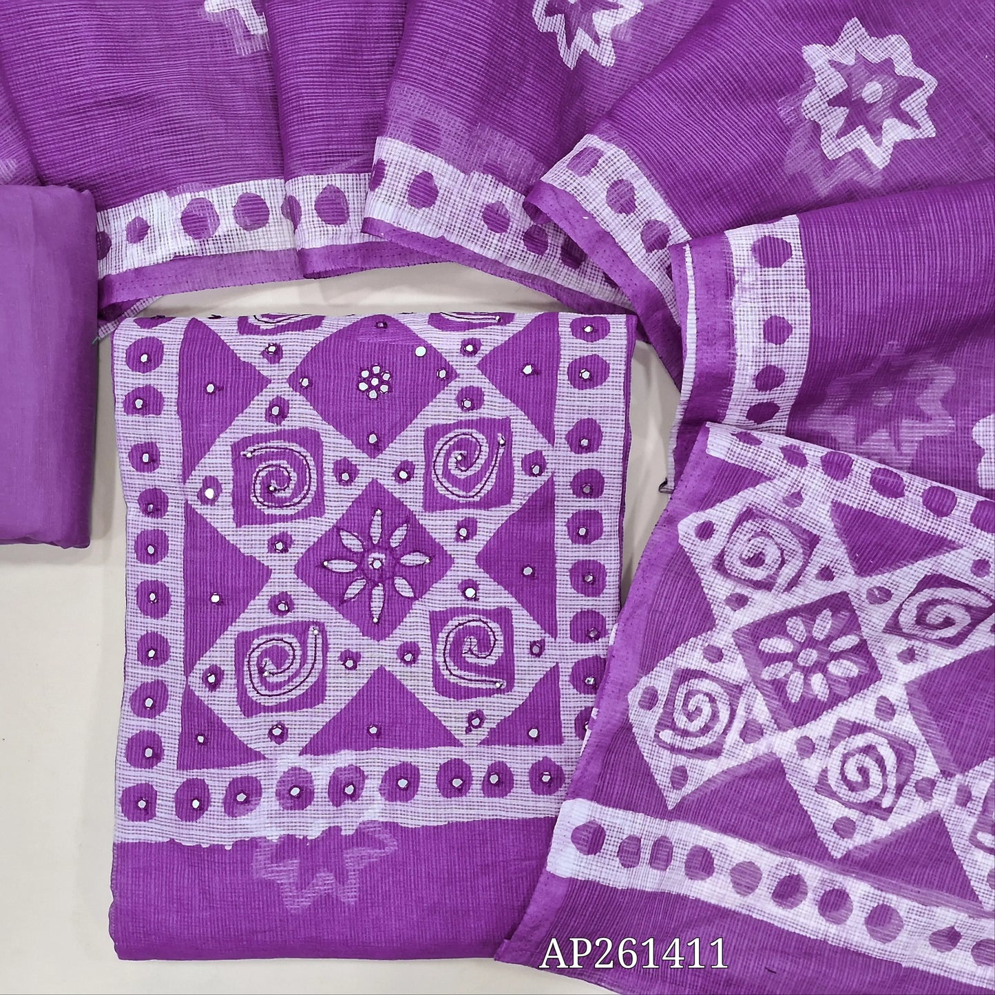 Purple pure kota unstitched salwar material,wax batik yoke with thread and faux mirror,wax batik printed allover,(thin, lining needed)matching silky fabric provided for both bottom and lining, batik design on kota silk cotton dupatta. AP261411