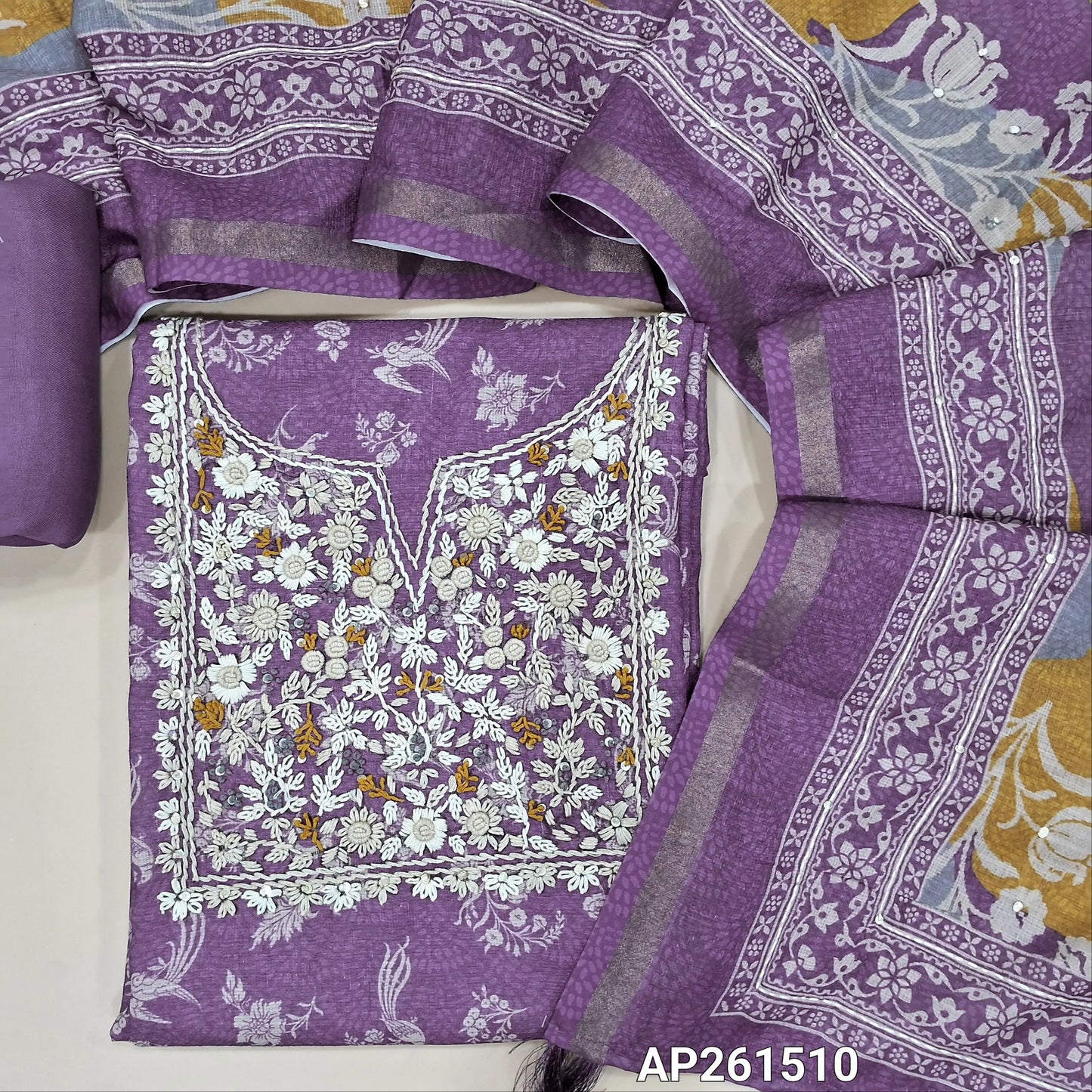 Purple printed spun silk cotton unstitched salwar material, hand embroidery work on yoke (lining needed)spun cotton bottom,hand embroidery and colourful printed soft spun silk cotton dupatta with gold tissue borders. AP261510