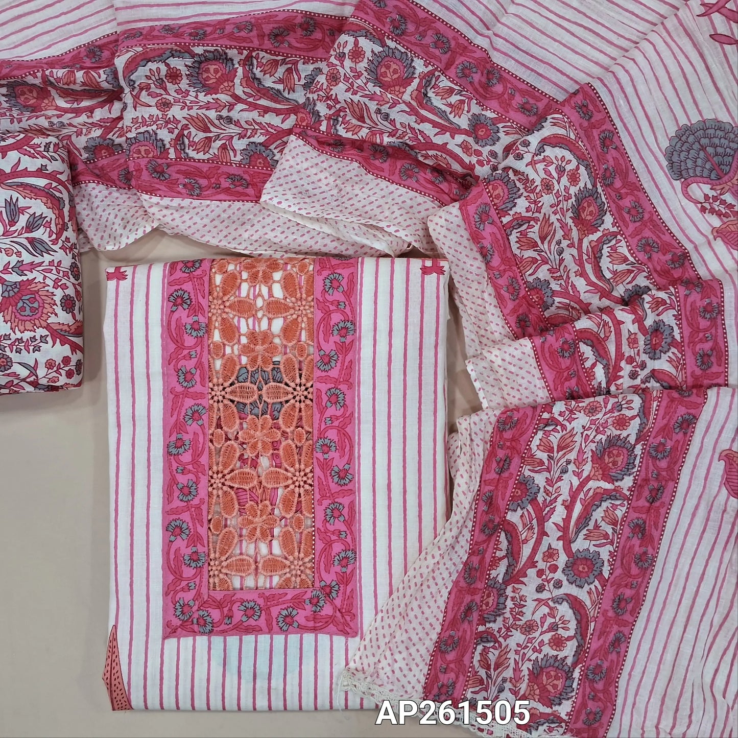 Off white base soft cotton unstitched salwar material,(PINK) lace work and cut work on yoke,vertical printed and floral design on front, (lining needed)floral printed cotton bottom,crinkled pure cotton dupatta. AP261505