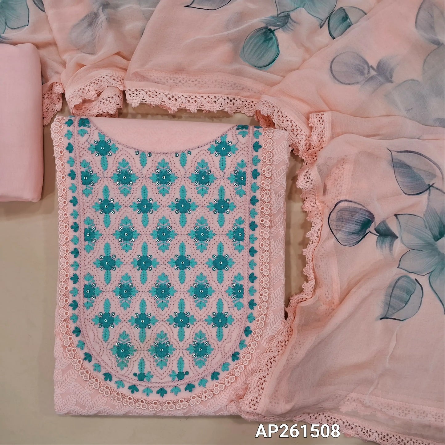 Light peachish pink pure cotton unstitched salwar material, embroidered yoke with lace work, thread embriodery on front,(lining needed)matching cotton bottom,brush paint work on fancy chiffon dupatta with lace tapping. AP261508