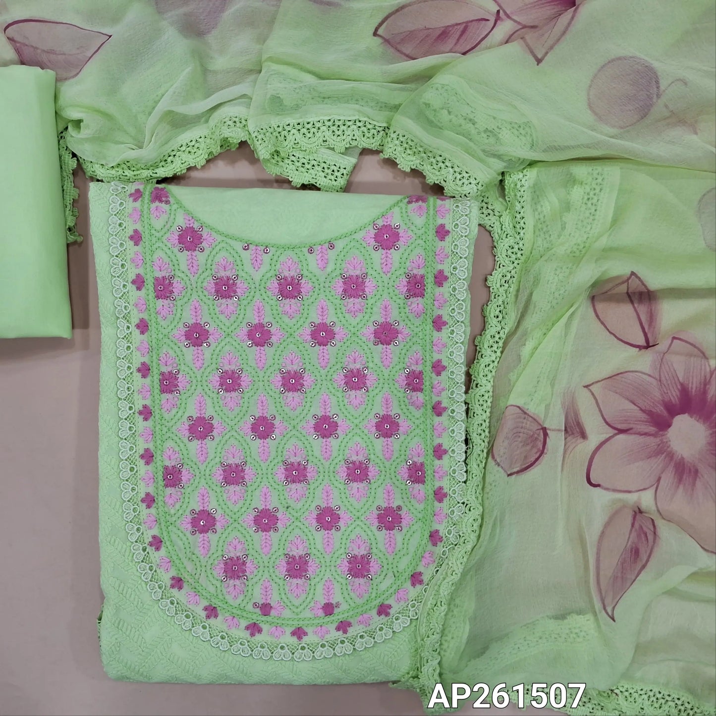 Pastel green pure cotton unstitched salwar material, embroidered yoke with lace work, thread embriodery on front,(lining needed)matching cotton bottom,brush paint work on fancy chiffon dupatta with lace tapping. AP261507
