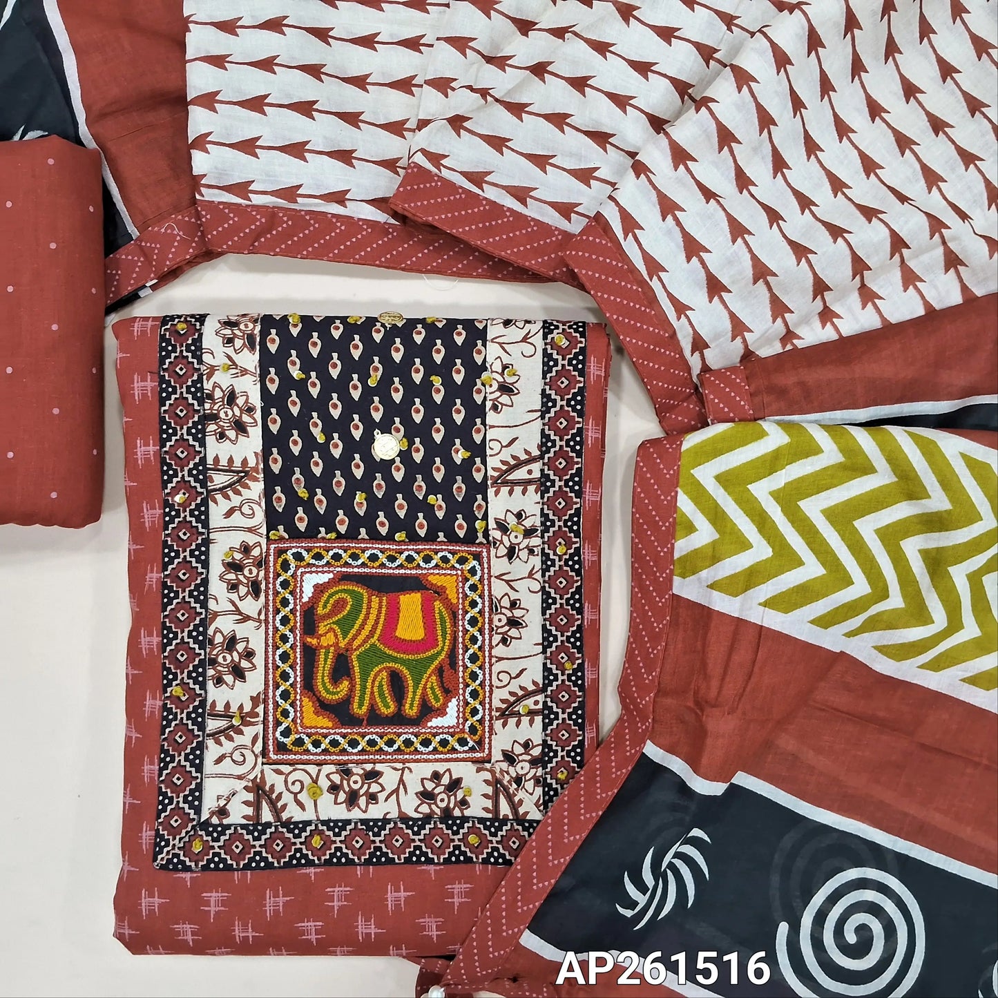 Reddish maroon ikat printed pure cotton unstitched salwar material, ajrak yoke patch with hand embroidery work(lining optional)printed cotton bottom,printed soft mul cotton dupatta. AP261516