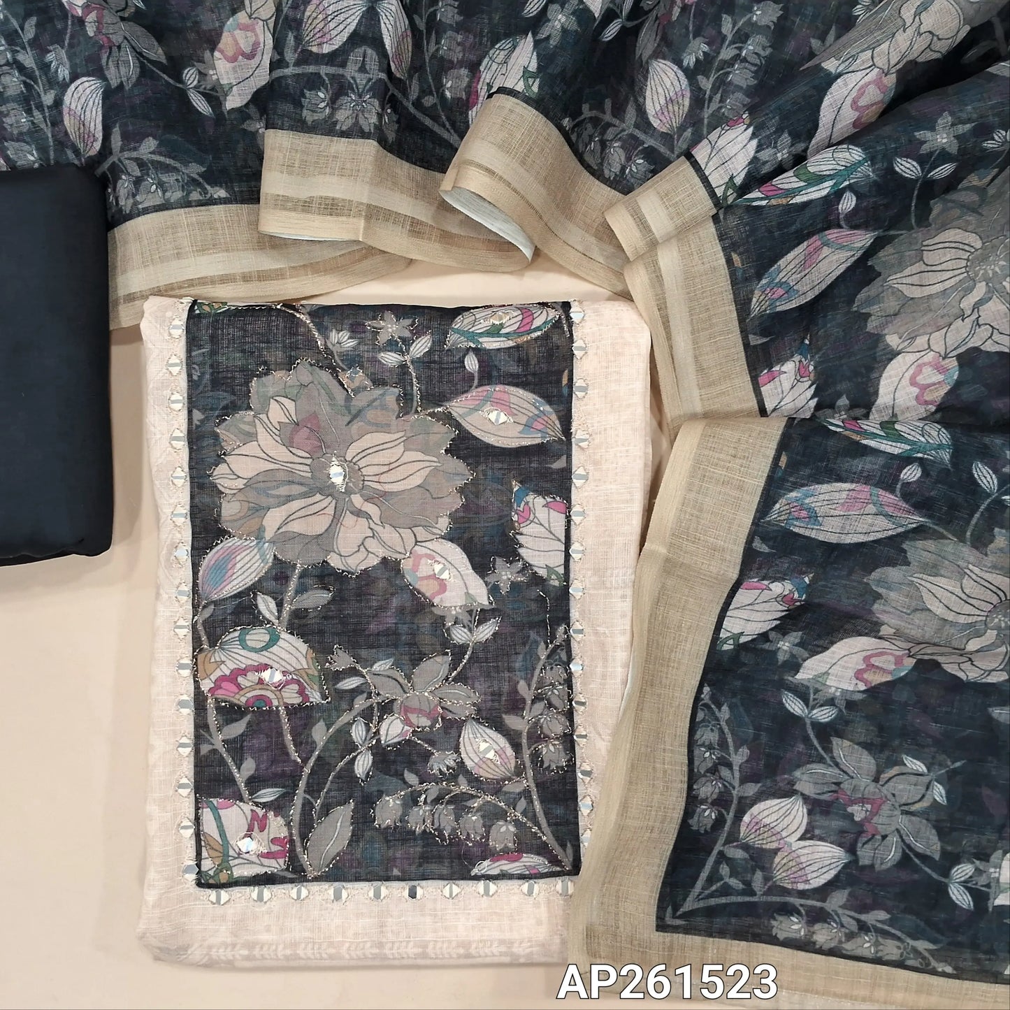 Off white base semi linen unstitched salwar material, printed all over,contrast yoke with floral design with real mirror,(textured, lining needed)black silk cotton bottom,printed semi linen dupatta. AP261523