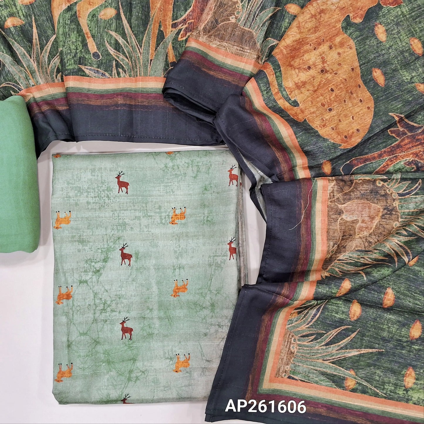 Green shade abstract printed semi gicha unstitched salwar material,deer prints all over(Thin, Lining Needed)santoon bottom, digital printed semi gicha dupatta. AP261606