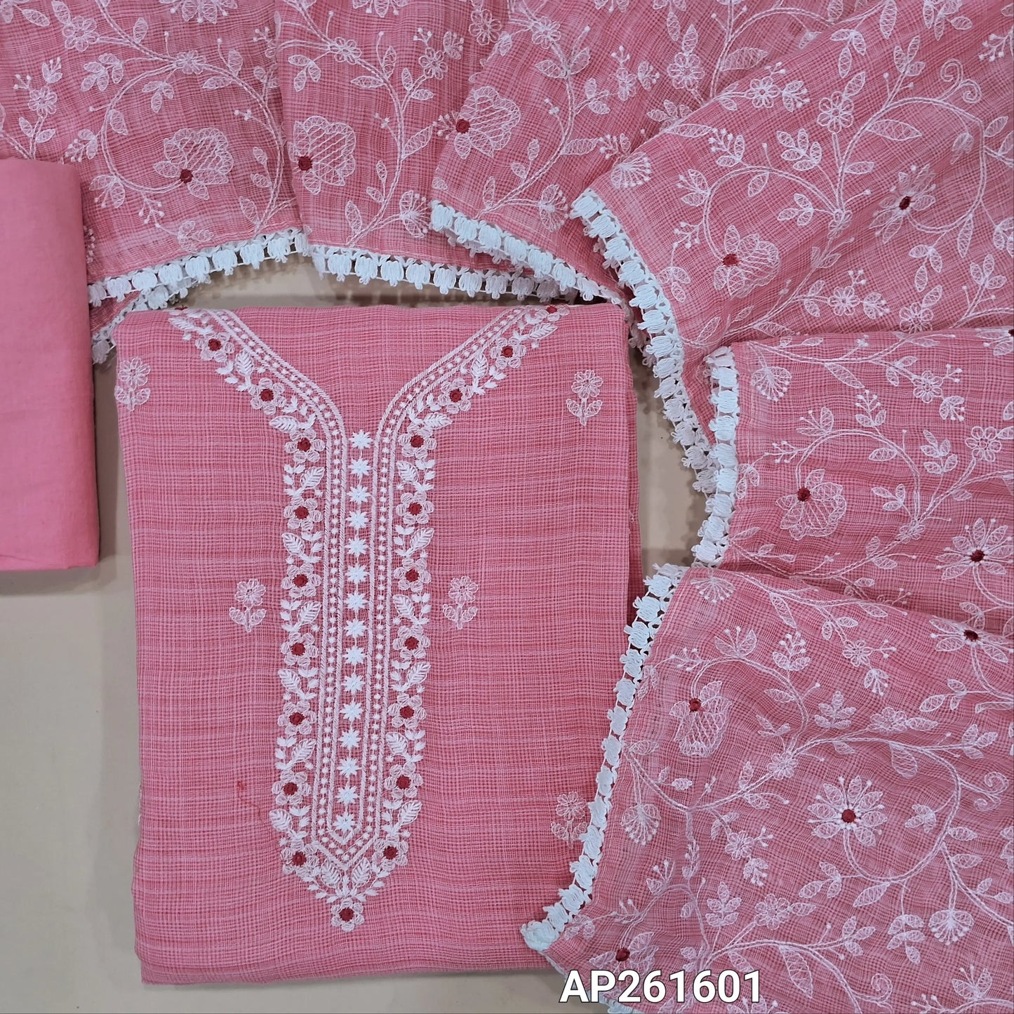 Pastel pink premium kota unstitched salwar material, embroidery work on yoke and front, self checked all over (Lining Needed) matching fabric provided for lining, NO BOTTOM, rich thread embroidery work on kota dupatta with lace tapping. AP261601
