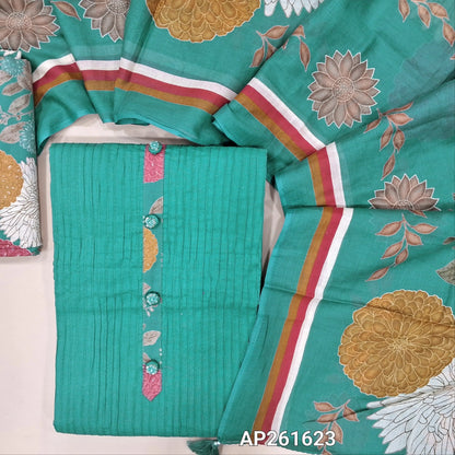 Pastel blue pure cotton unstitched salwar material,simple yoke with fancy buttons, pintex detailing on front,(lining needed) multicoloured printed cotton bottom,colorful floral printed mul cotton dupatta. AP261623