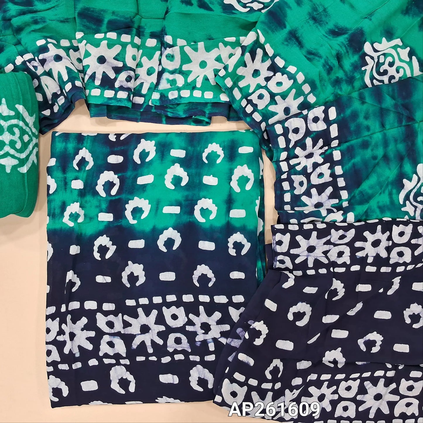 Turquoise green & dark blue shibori dyed and wax batik pure crepe georgette unstitched salwar material, (lining needed) batik dyed santoon bottom,dual shaded shibori dyed and wax batik dyed pure crepe georgette dupatta(TAPPING NEEDED). AP261609