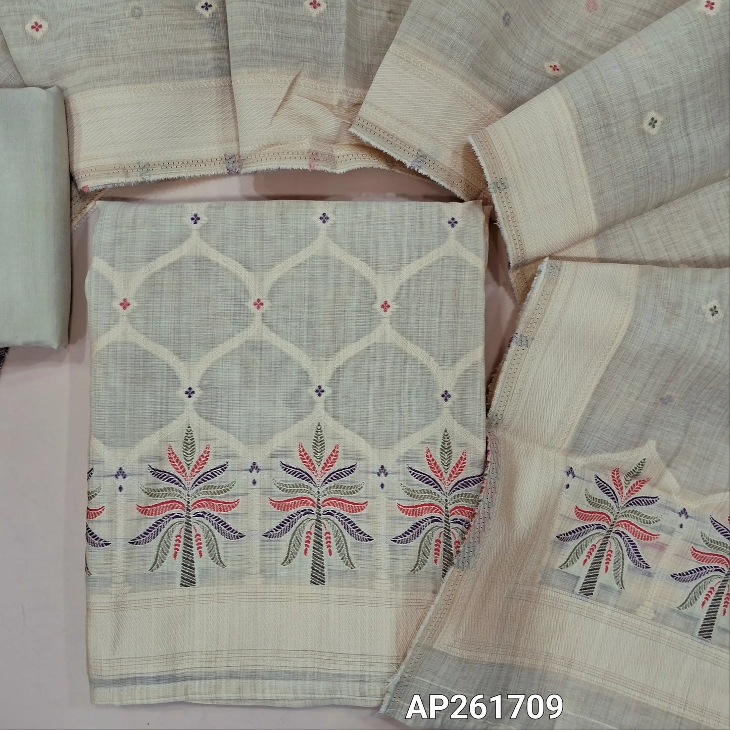 Light beige silk cotton unstitched salwar material,rich thread weaving on front,(Silky, Lining Needed)silky bottom, floral buttas on silk cotton dupatta with thread weaving pallu and borders(TAPPING NEEDED). AP261709