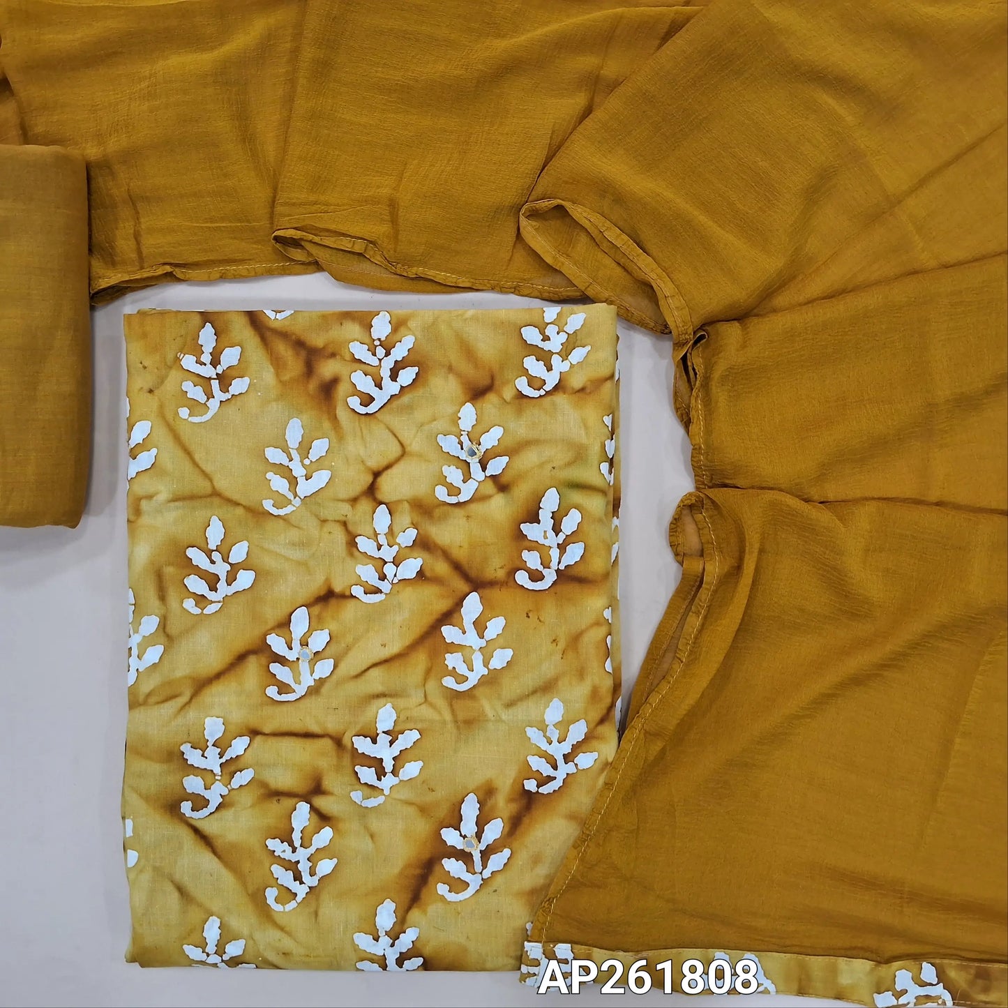 Mehandhi yellow original wax batik dyed pure soft cotton unstitched salwar material(lining optional)faux mirror work on front,matching drum dyed cotton bottom, printed fancy chiffon dupatta.AP261808