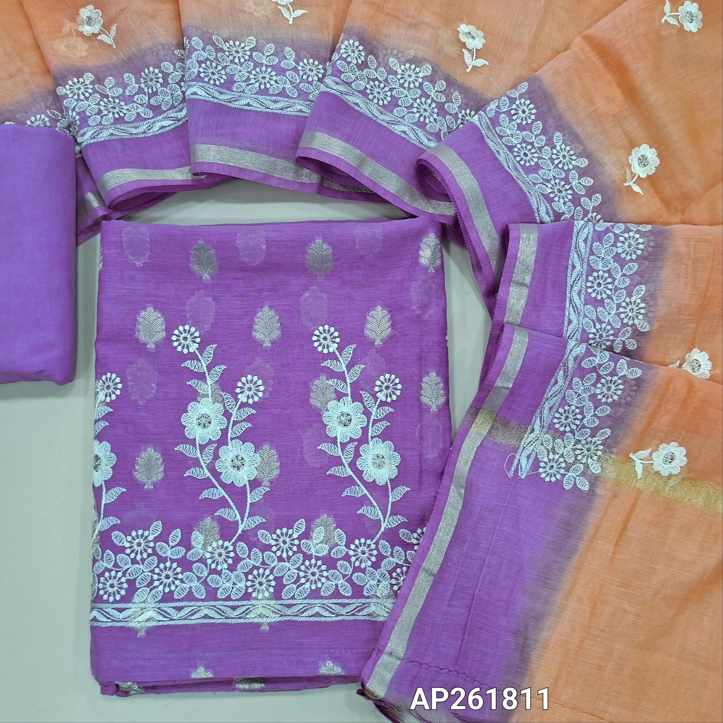Designer purple mul chanderi unstitched salwar material (soft,Lining Needed) antique gold zari buttas all over, embroidery work on daman, matching spun cotton bottom, embroidery work on mul chanderi dual shaded dupatta with gold tissue borders.AP261811