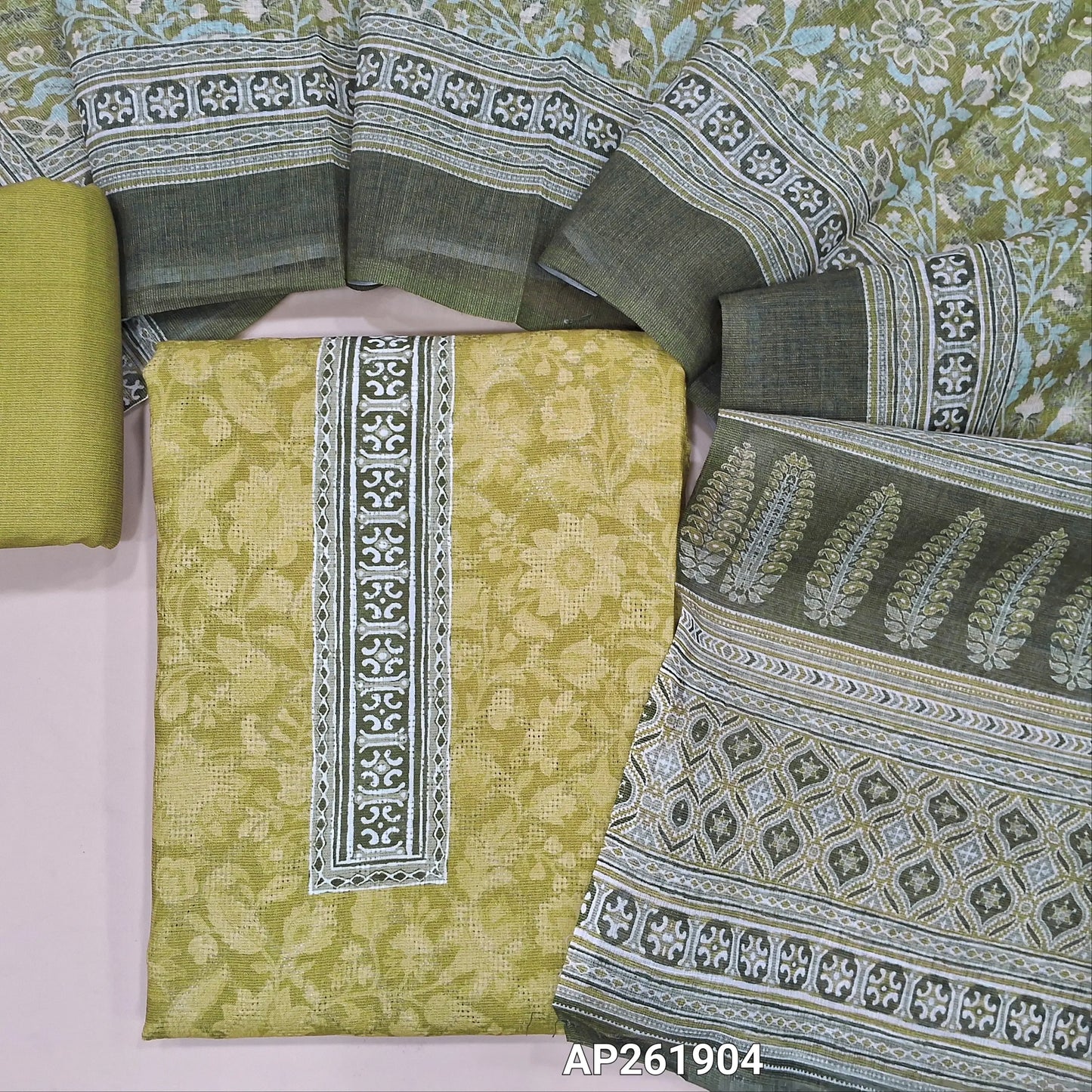 Olive green soft spun silk cotton unstitched salwar material, printed yoke, floral design all over (lining optional)matching spun cotton bottom,digital printed silk cotton dupatta. AP261904