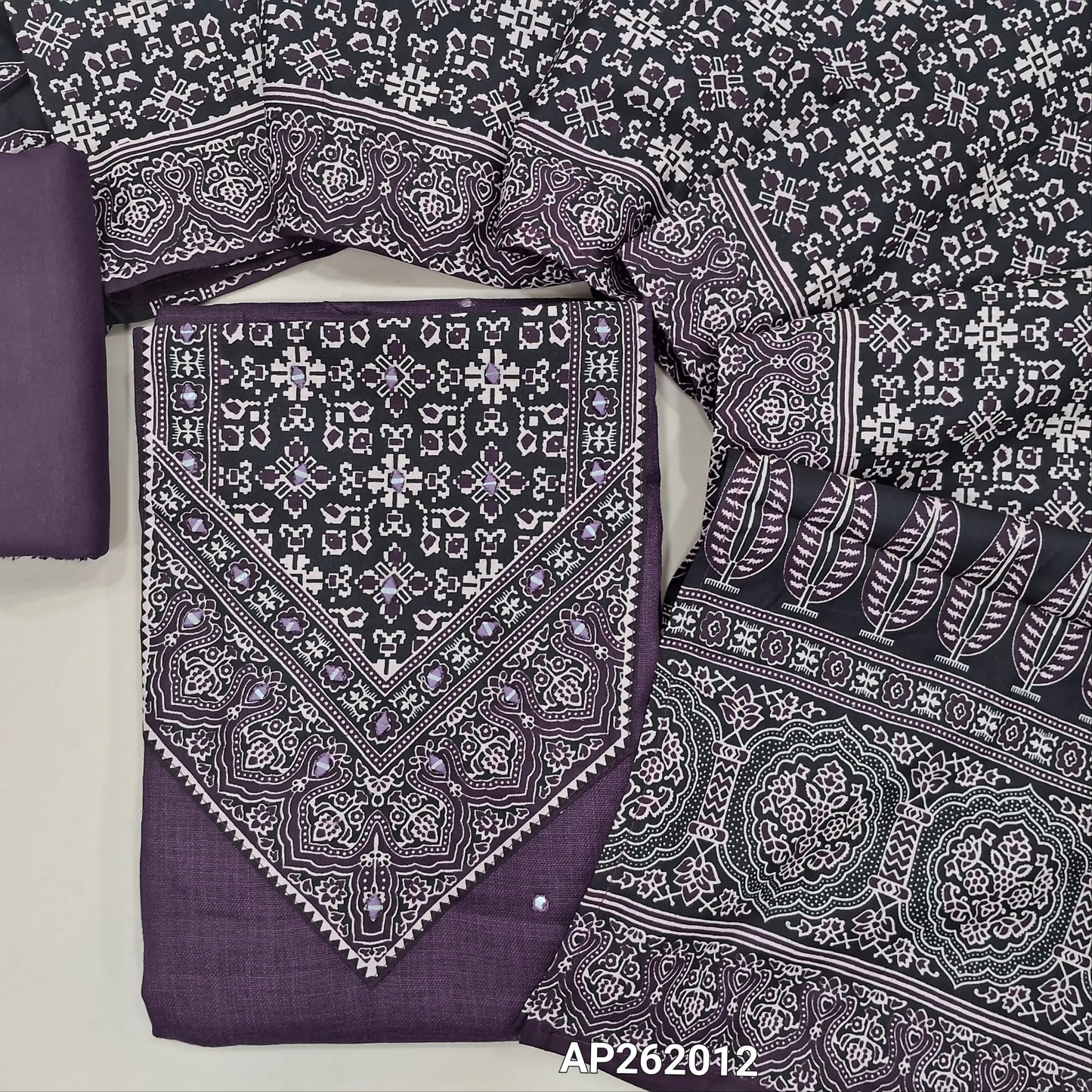 Purple semi linen unstitched salwar material, ajrak yoke patch with real mirror,faux mirror work on front, (textured, lining needed)spun cotton bottom,ajral printed cotton dupatta. AP262012