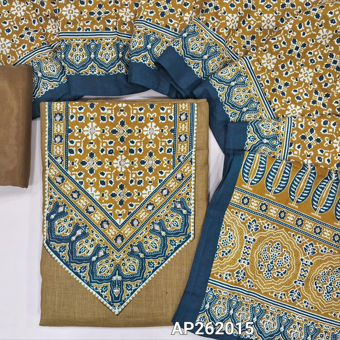 Dark mehandhi yellow semi linen unstitched salwar material, ajrak yoke patch with real mirror,faux mirror work on front, (textured, lining needed)spun cotton bottom,ajral printed cotton dupatta. AP262015