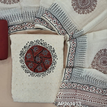 Off white base schiffli embroidered cotton unstitched salwar material (lining needed) ajrak patch yoke with block printed and real mirror,maroon cotton bottom, hand block printed,and patch work on kota cotton dupatta with lace taping. AP261913