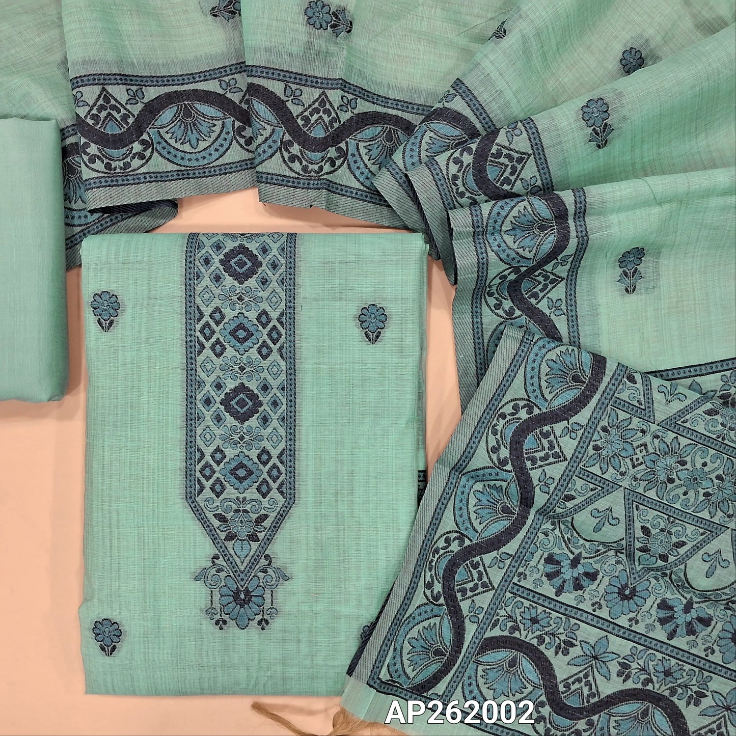 Pastel blue silk cotton unstitched salwar material,floral buttas on front,thread weaving on yoke and daman,(Silky, Lining Needed)silky bottom, floral buttas on silk cotton dupatta with thread weaving pallu and borders(TAPPING NEEDED). AP262002
