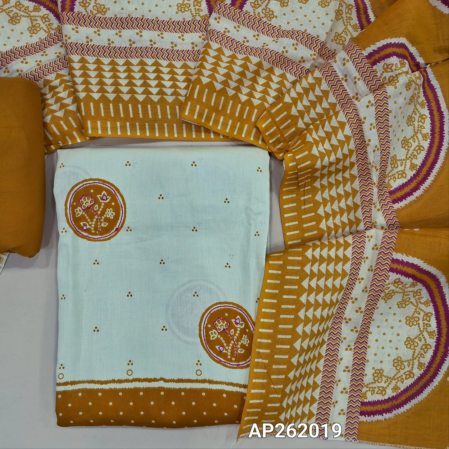 Off white base satin cotton unstitched salwar material, floral design with sequins work on front, contrast daman,(lining needed) mehandhi yellow spun cotton bottom,printed cotton dupatta. AP262019