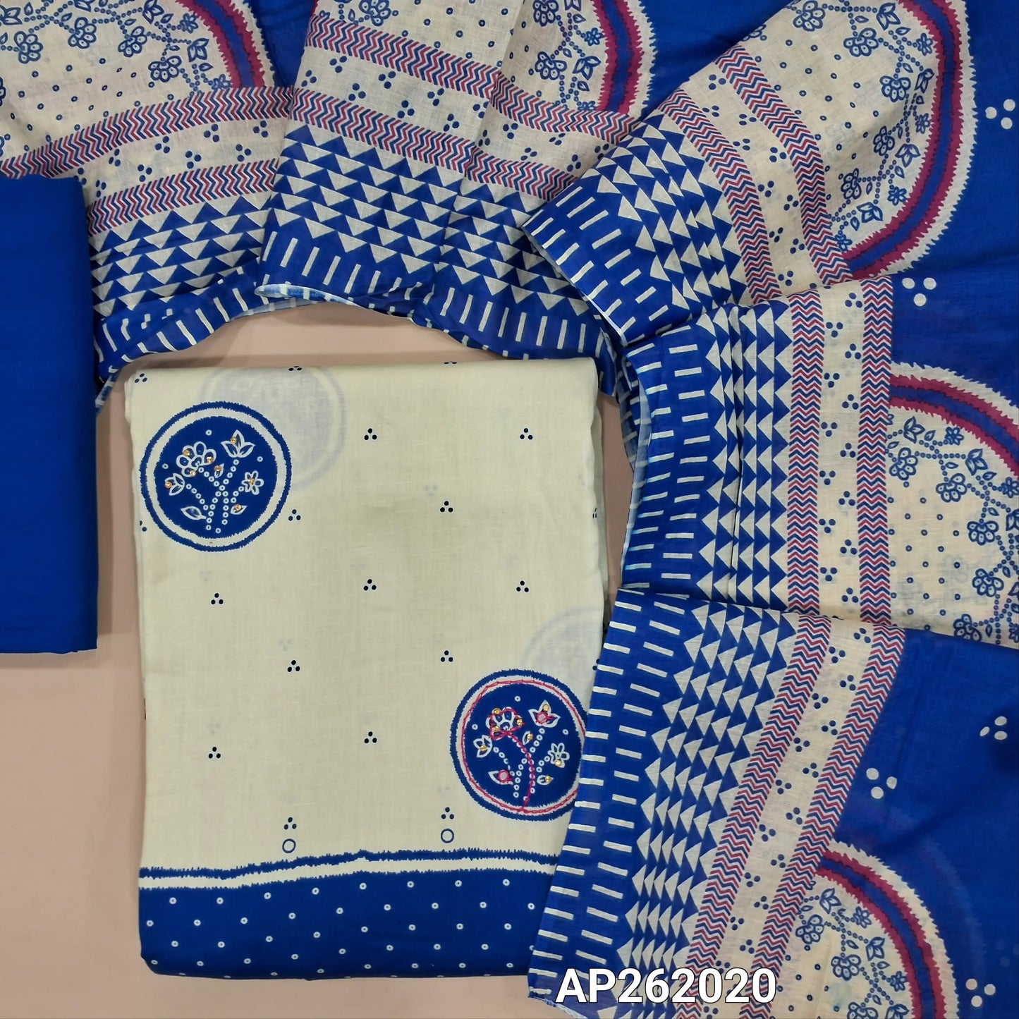 Off white base satin cotton unstitched salwar material, floral design with sequins work on front, contrast daman,(lining needed) royal blue spun cotton bottom,printed cotton dupatta. AP262020