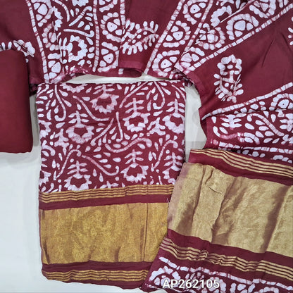 Dark maroon Original wax batik dyed fancy silk cotton unstitched salwar material(lining needed) tissue borders on daman, matching spun cotton bottom, batik dyed fancy silk cotton dupatta with tissue border on pallu. AP262105