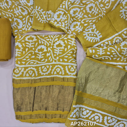 Mehandhi yellow Original wax batik dyed fancy silk cotton unstitched salwar material(lining needed) tissue borders on daman, matching spun cotton bottom, batik dyed fancy silk cotton dupatta with tissue border on pallu. AP262107
