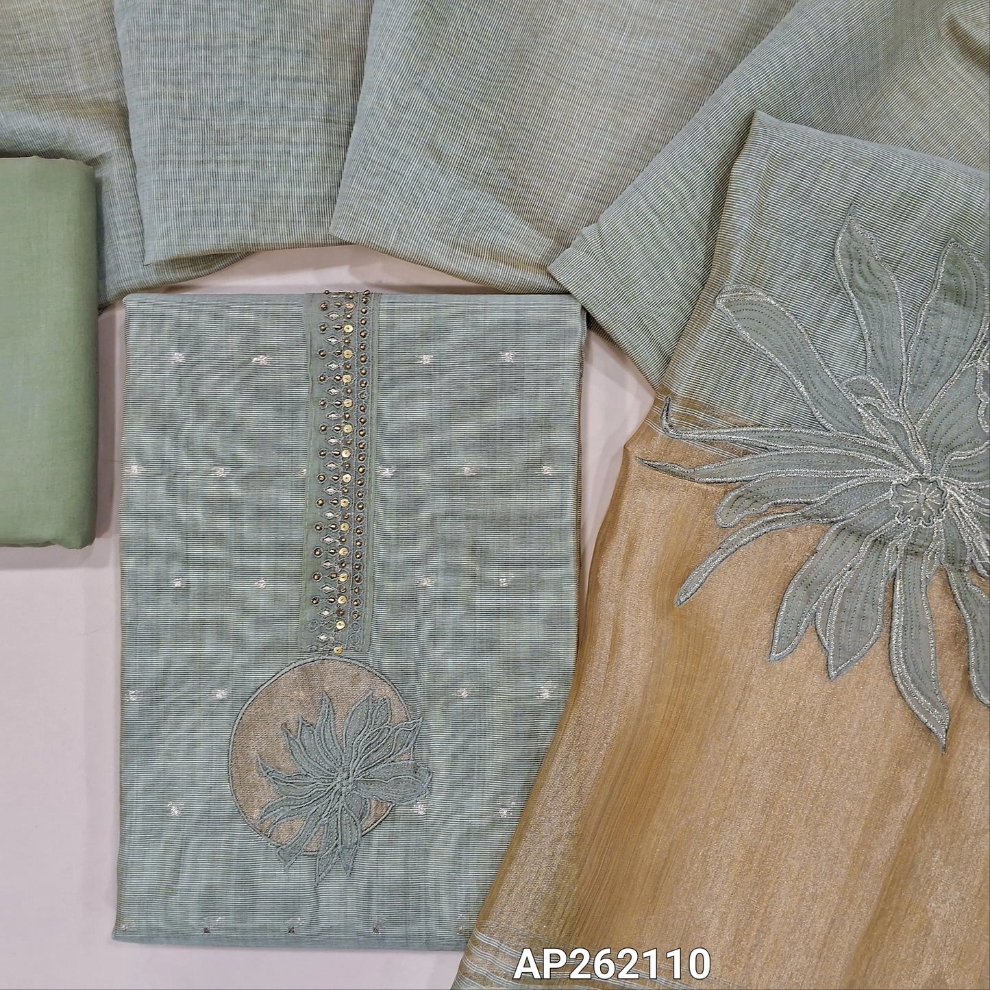 Sage green premium silk cotton unstitched salwar material,bead,antique gold & applique work on yoke(lining needed) zari buttas all over, daman with tissue borders, matching drum dyed cotton bottom, designer premium silk cotton dupatta . AP262110