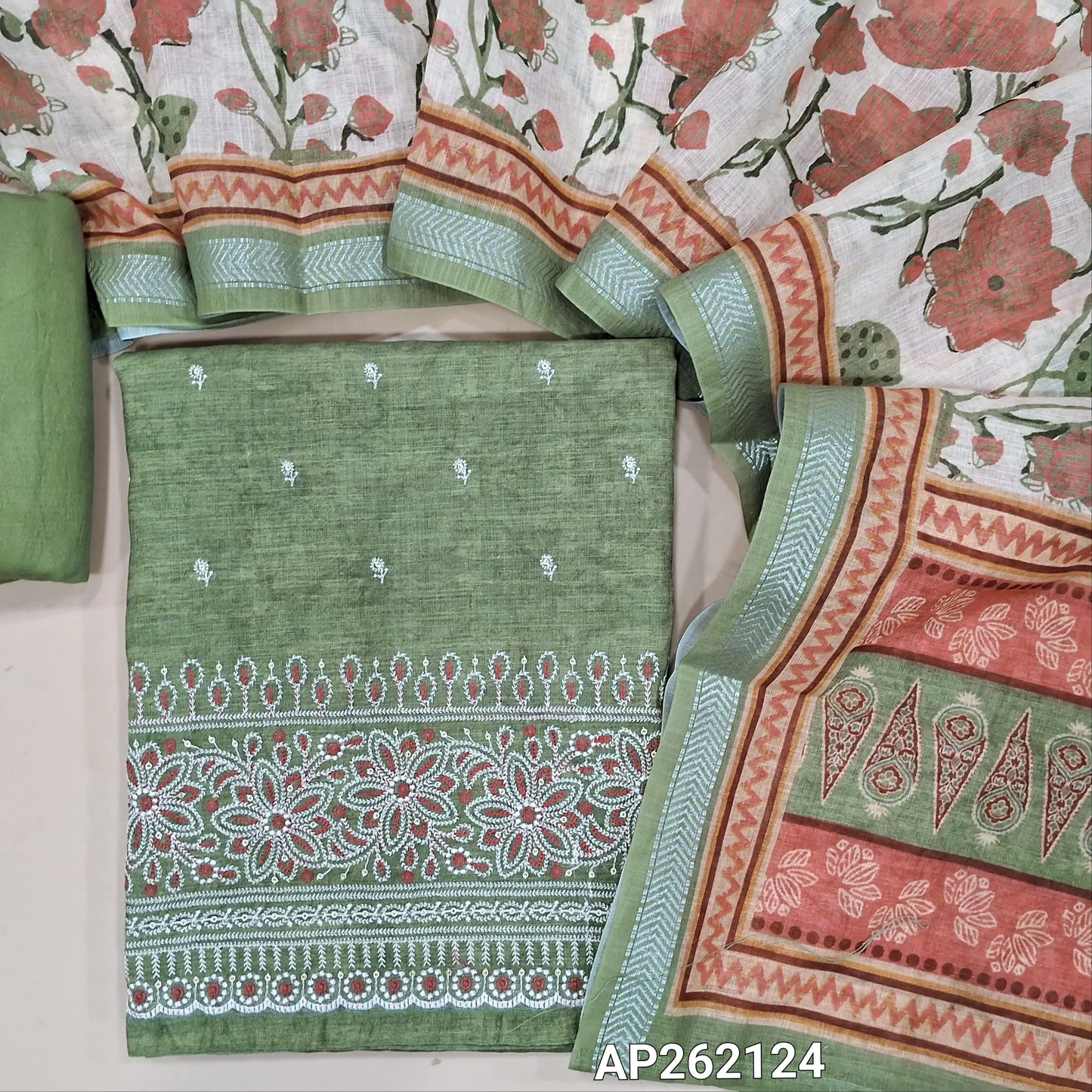 Light leafy green abstract printed premium linen unstitched salwar material,floral embroidery work on front( lining needed) rich embroidery work on daman, matching silky bottom, floral printed semi linen dupatta with silver zari borders. AP262124