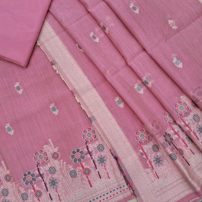 Lotus pink silk cotton unstitched salwar material,thread buttas on front,thread weaving on yoke and daman,(Silky, Lining Needed)matching silky bottom, floral buttas on silk cotton dupatta with thread weaving pallu and borders(TAPPING NEEDED). AP262205