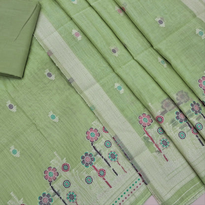 Pastel green silk cotton unstitched salwar material,thread buttas on front,thread weaving on yoke and daman,(Silky, Lining Needed)matching silky bottom, floral buttas on silk cotton dupatta with thread weaving pallu and borders(TAPPING NEEDED). AP262206