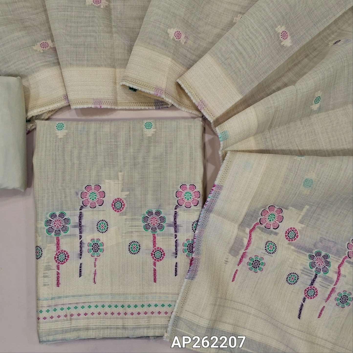 Rich beige silk cotton unstitched salwar material,thread buttas on front,thread weaving on yoke and daman,(Silky, Lining Needed)matching silky bottom, floral buttas on silk cotton dupatta with thread weaving pallu and borders(TAPPING NEEDED). AP262207