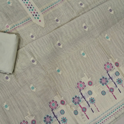 Rich beige silk cotton unstitched salwar material,thread buttas on front,thread weaving on yoke and daman,(Silky, Lining Needed)matching silky bottom, floral buttas on silk cotton dupatta with thread weaving pallu and borders(TAPPING NEEDED). AP262207