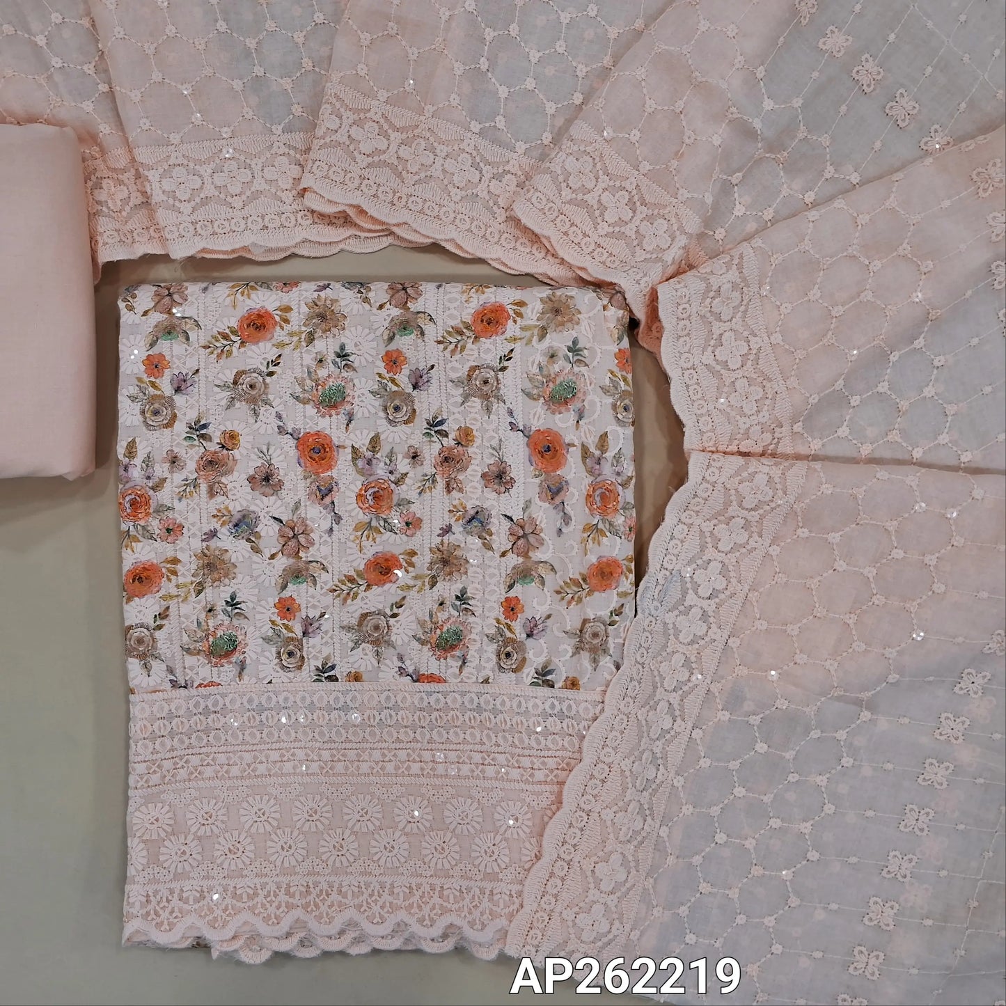 Peachish pink floral printed glazed cotton unstitched salwar material (lining needed) self embroidery andsequins work on front,matching cotton bottom, embroidery and sequins work on mul cotton dupatta with scallop borders.(TAPING NEEDED) AP262219
