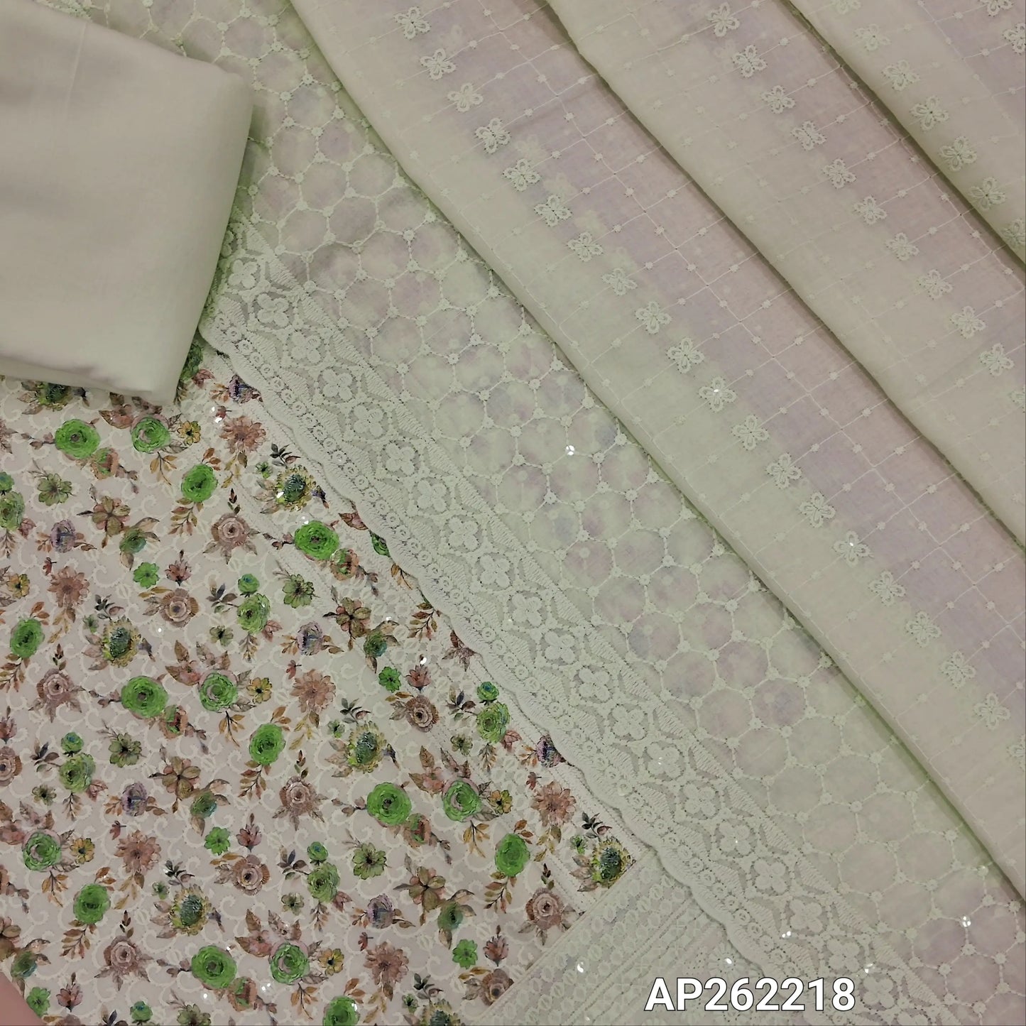 Pastel green floral printed glazed cotton unstitched salwar material (lining needed) self embroidery andsequins work on front,matching cotton bottom, embroidery and sequins work on mul cotton dupatta with scallop borders.(TAPING NEEDED) AP262218