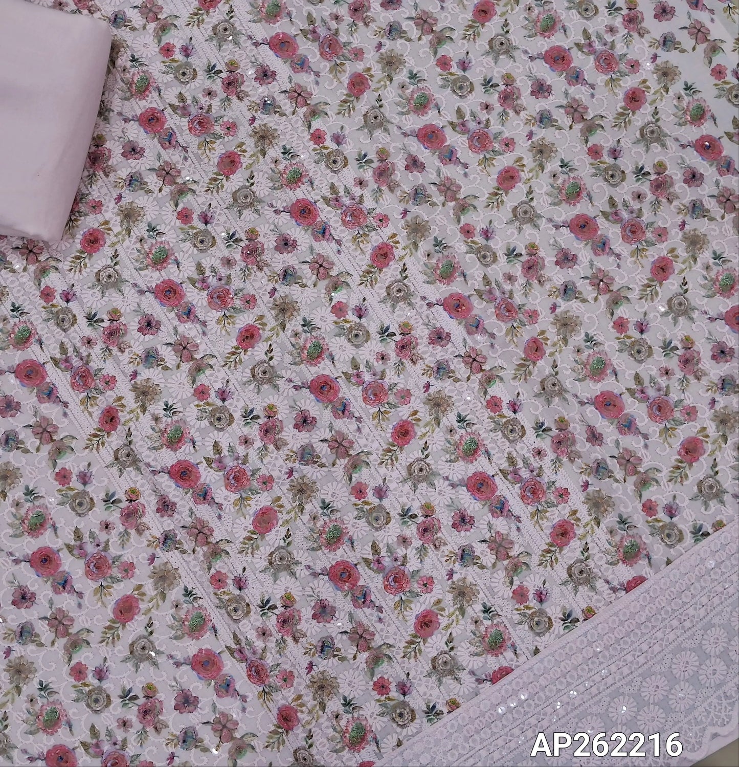 Pastel pink floral printed glazed cotton unstitched salwar material (lining needed) self embroidery and sequins work on front,matching cotton bottom, embroidery and sequins work on mul cotton dupatta with scallop borders.(TAPING NEEDED) AP262216