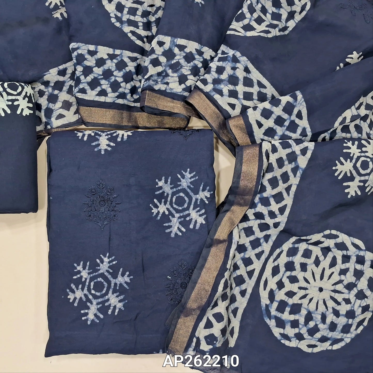 Dark blue premium silk cotton unstitched salwar material(lining needed)self embroidery work on front, batik design all over, wax batik cotton bottom, self embroidery and batik design on silk cotton dupatta with tissue borders.AP262210