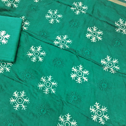 Peacock green premium silk cotton unstitched salwar material(lining needed)self embroidery work on front, batik design all over, wax batik cotton bottom, self embroidery and batik design on silk cotton dupatta with tissue borders.AP262211