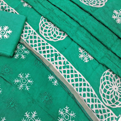 Peacock green premium silk cotton unstitched salwar material(lining needed)self embroidery work on front, batik design all over, wax batik cotton bottom, self embroidery and batik design on silk cotton dupatta with tissue borders.AP262211