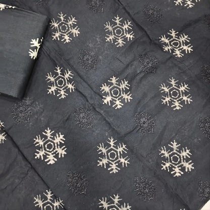 Black premium silk cotton unstitched salwar material(lining needed)self embroidery work on front, batik design all over, wax batik cotton bottom, self embroidery and batik design on silk cotton dupatta with tissue borders.AP262212