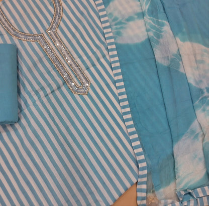 Pastel blue vertical printed pure soft cotton unstitched salwar material, sugar bead, faux mirror and cut work on yoke, (lining needed)drum dyed cotton fabric provided for lining, NO BOTTOM,shibori dyed pure chiffon dupatta. AP262203