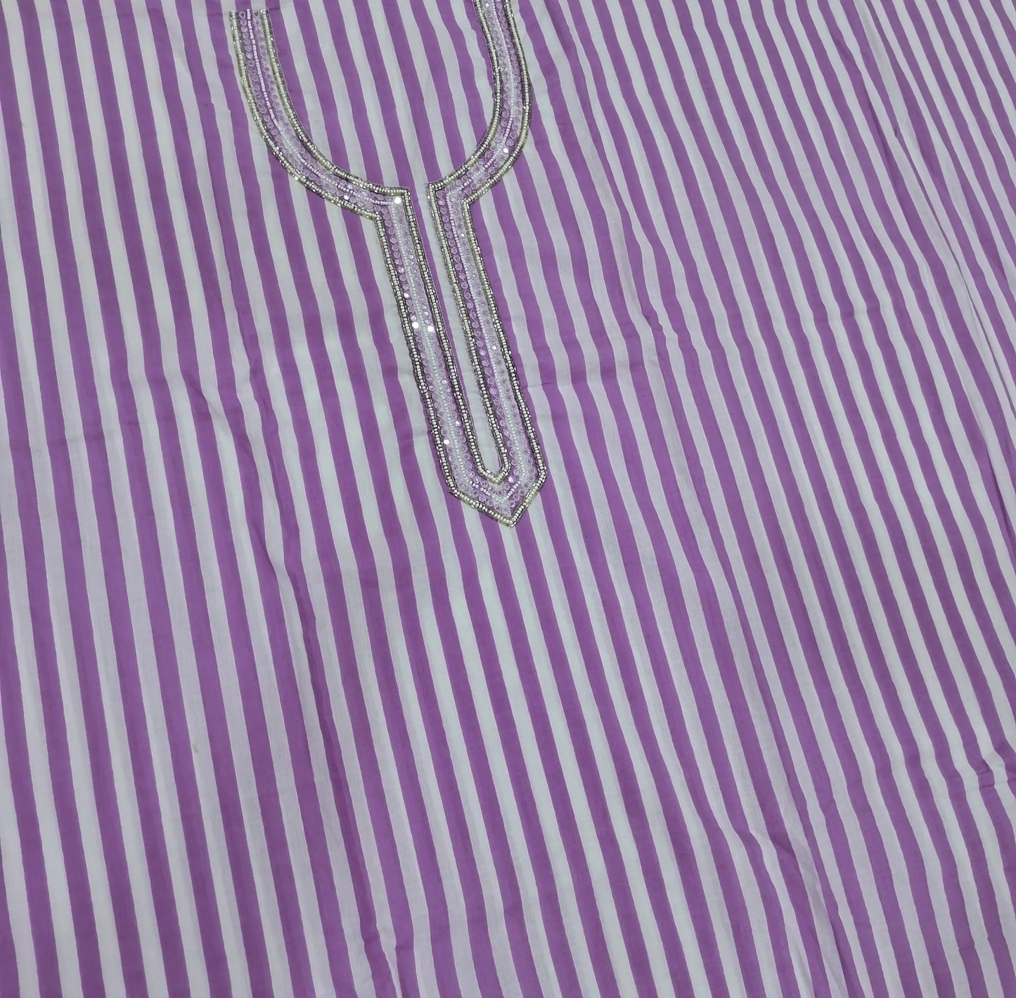 Light purple vertical printed pure soft cotton unstitched salwar material, sugar bead, faux mirror and cut work on yoke, (lining needed)drum dyed cotton fabric provided for lining, NO BOTTOM,shibori dyed pure chiffon dupatta. AP262201