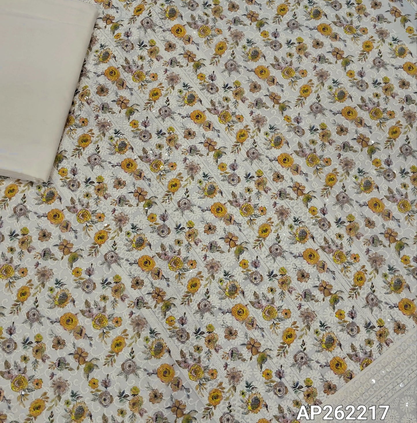 Light beige floral printed glazed cotton unstitched salwar material (lining needed) self embroidery and sequins work on front,matching cotton bottom, embroidery and sequins work on mul cotton dupatta with scallop borders.(TAPING NEEDED) AP262217