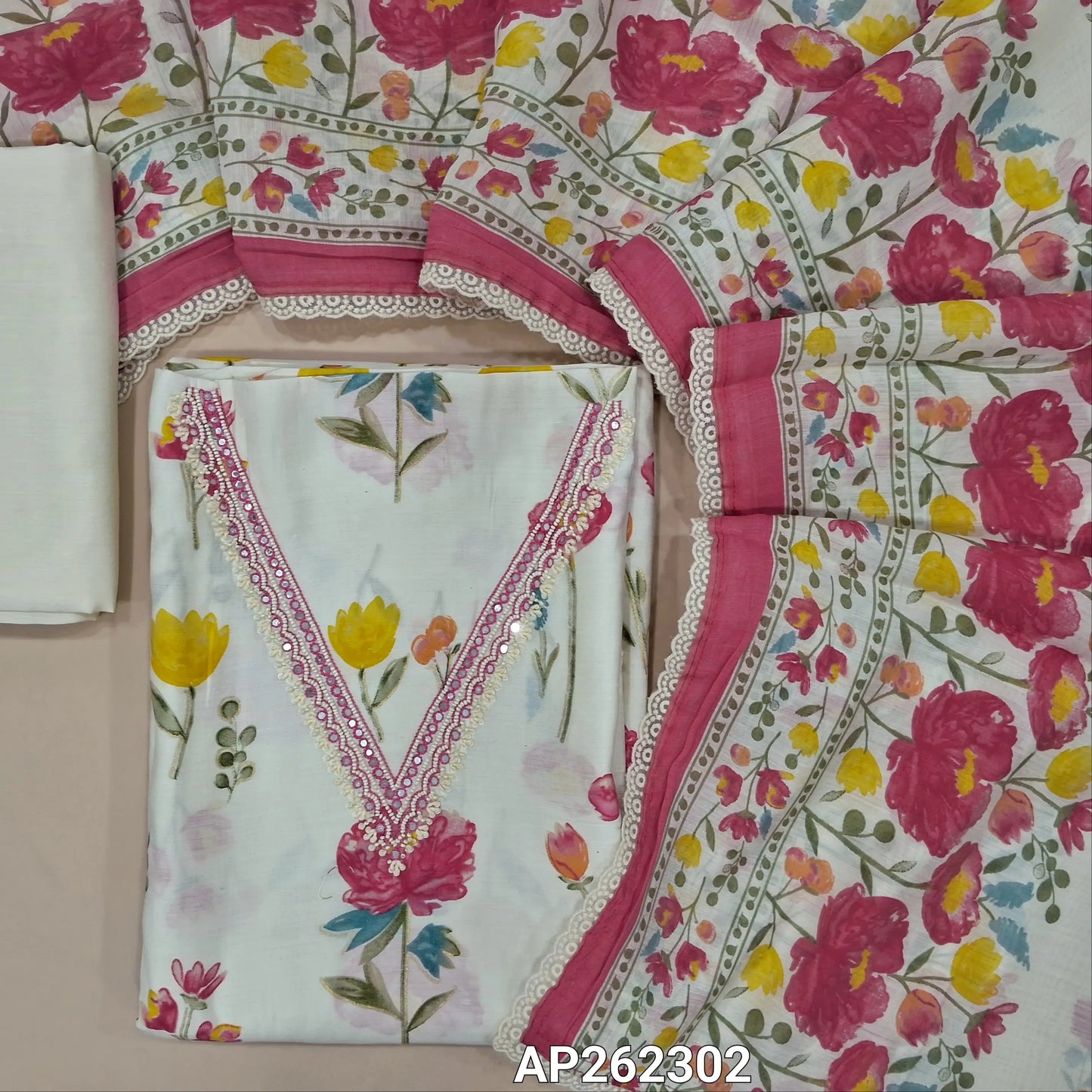 Off white base floral printed premium muslin chanderi unstitched salwar material,V neck with sugar bead and faux mirror work,(PINK)(lining needed)santoon bottom,floral printed on muslin chanderi dupatta with lace tapping. AP262302