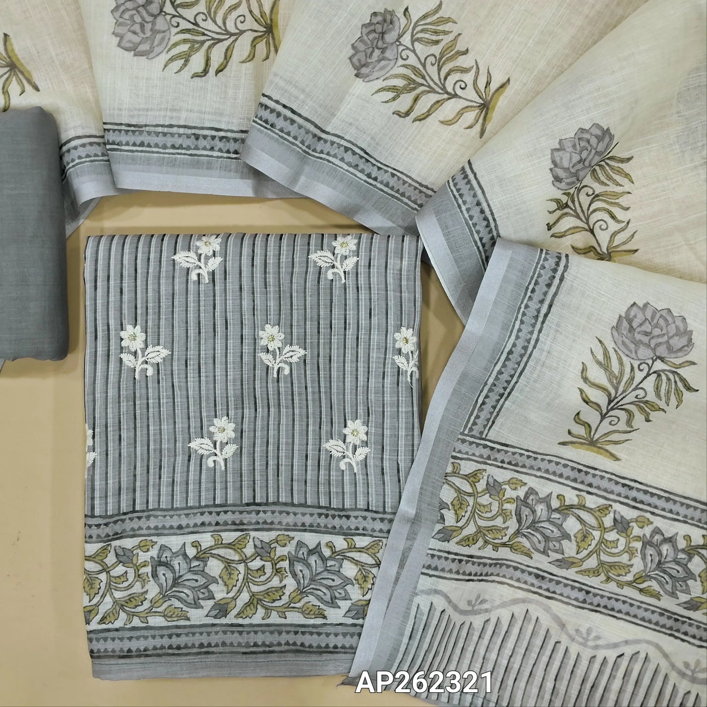 Light grey semi linen unstitched salwar material,vertical printed and embroidery work on front, (lining needed)drum dyed cotton fabric provided for lining , NO BOTTOM, floral printed semi linen dupatta. AP262321