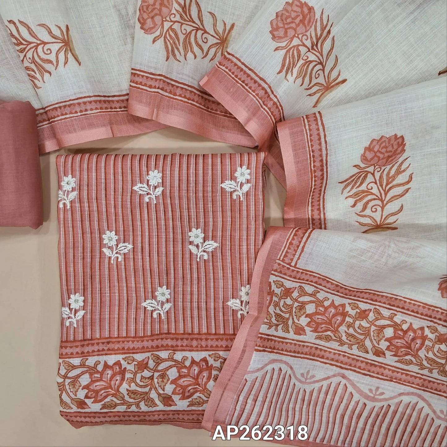 Pastel pink semi linen unstitched salwar material,vertical printed and embroidery work on front, (lining needed)drum dyed cotton fabric provided for lining , NO BOTTOM, floral printed semi linen dupatta. AP262318