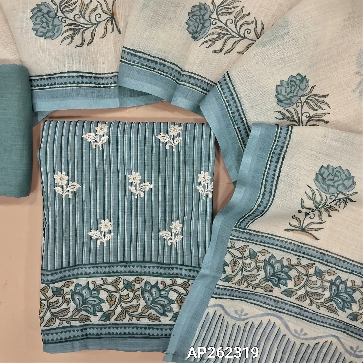 Powder blue semi linen unstitched salwar material,vertical printed and embroidery work on front, (lining needed)drum dyed cotton fabric provided for lining , NO BOTTOM, floral printed semi linen dupatta. AP262319