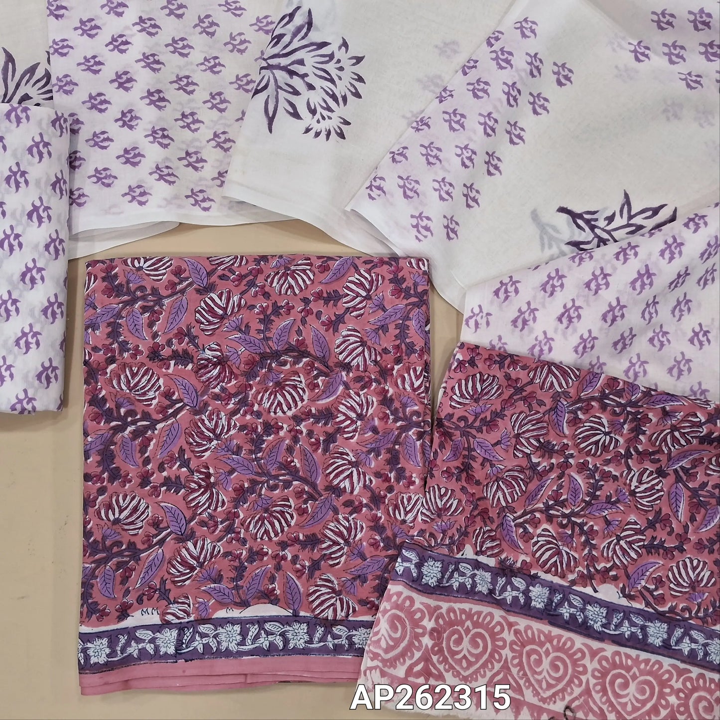 Pink hand block printed pure mul cotton unstitched salwar material, (lining needed) hand block printed cotton bottom,block printed full length mul cotton dupatta.(TAPING NEEDED, INCONSISTENT PRINTS ARE NOT DEFECTS). AP262315