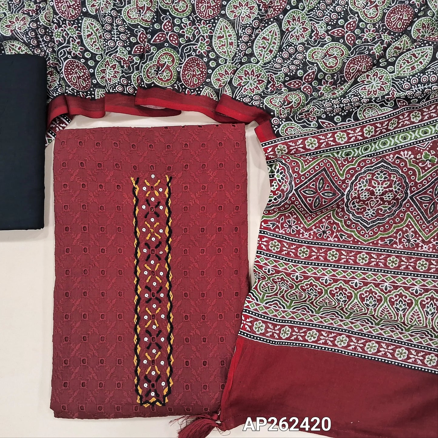Dark maroon schiffli embroidered pure cotton unstitched salwar material(lining needed)hand embroidery, cut work and sequins work on yoke, black drum dyed cotton bottom,printed premium soft mul cotton dupatta. AP262420