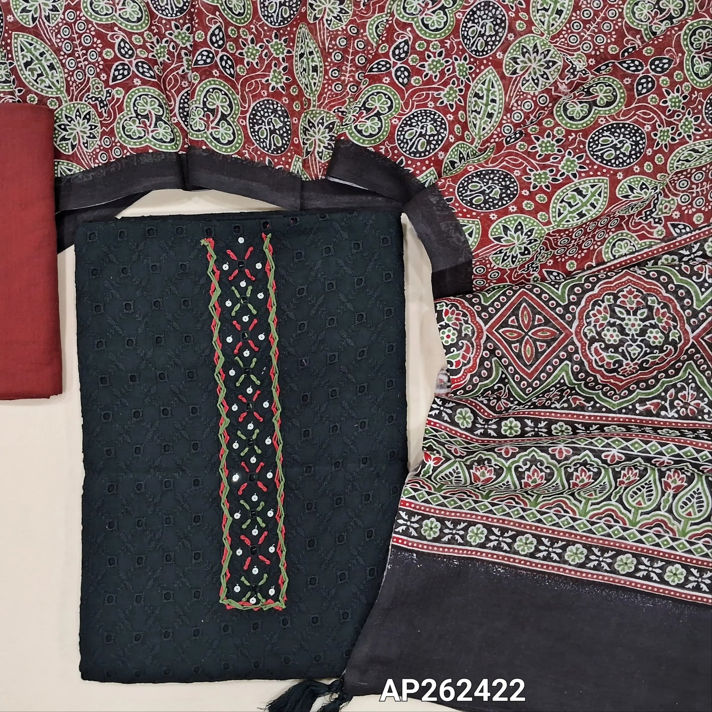 Black schiffli embroidered pure cotton unstitched salwar material(lining needed)hand embroidery, cut work and sequins work on yoke, maroon drum dyed cotton bottom,printed premium soft mul cotton dupatta. AP262422