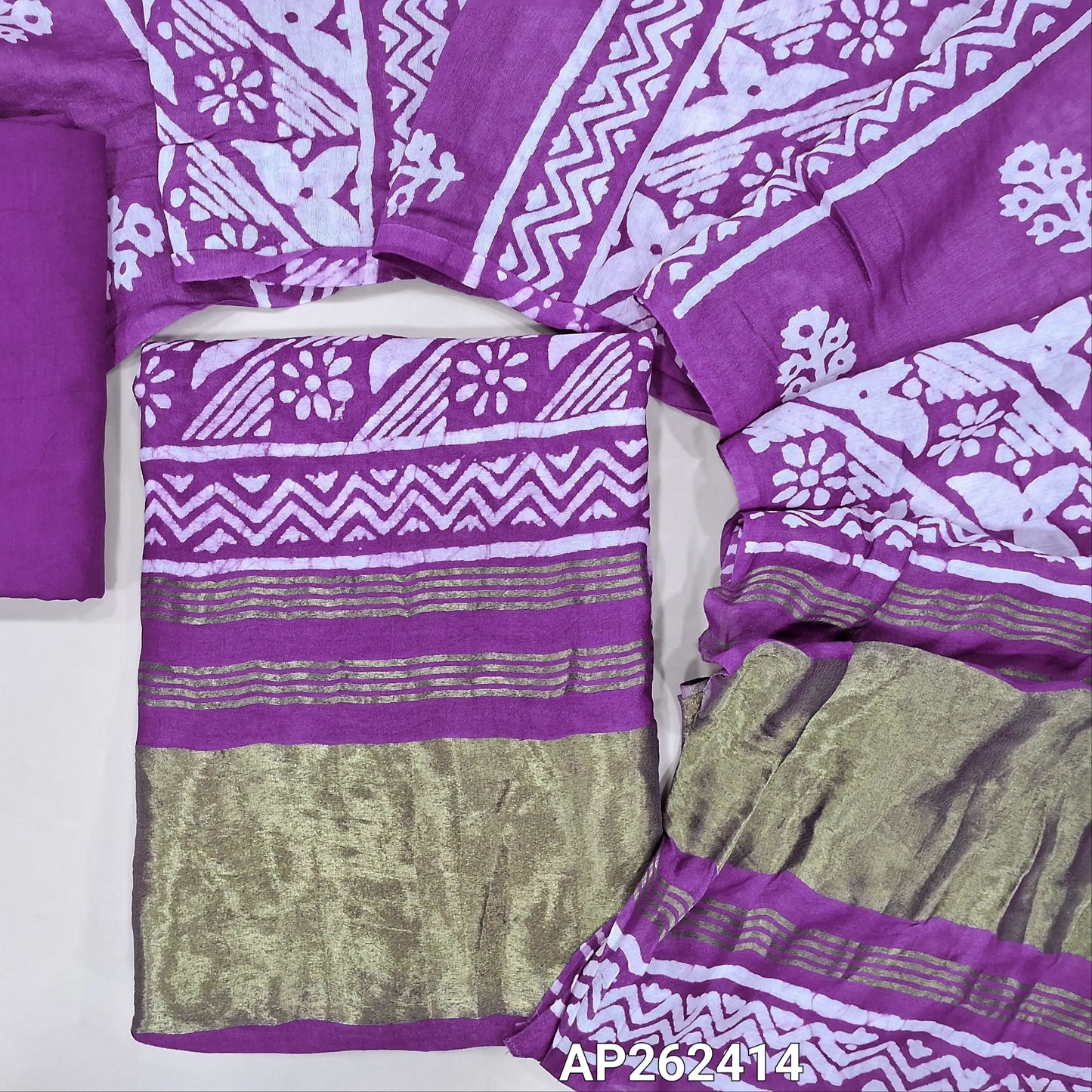 Dark purple original wax batik dyed fancy silk cotton unstitched salwar material(lining needed) tissue borders on daman, matching cotton bottom, batik dyed fancy silk cotton dupatta with tissue pallu. AP262414