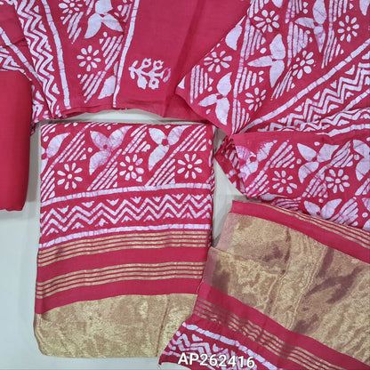 Bright pink original wax batik dyed fancy silk cotton unstitched salwar material(lining needed) tissue borders on daman, matching cotton bottom, batik dyed fancy silk cotton dupatta with tissue pallu. AP262416