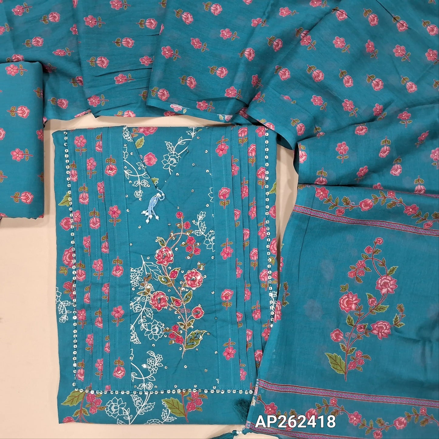 Teal blue printed pure cotton unstitched salwar material, v neck with zari embroidery, sugar bead ,sequins and pintex detailing (lining optional) printed cotton bottom, printed pure full length mul cotton dupatta. AP262418